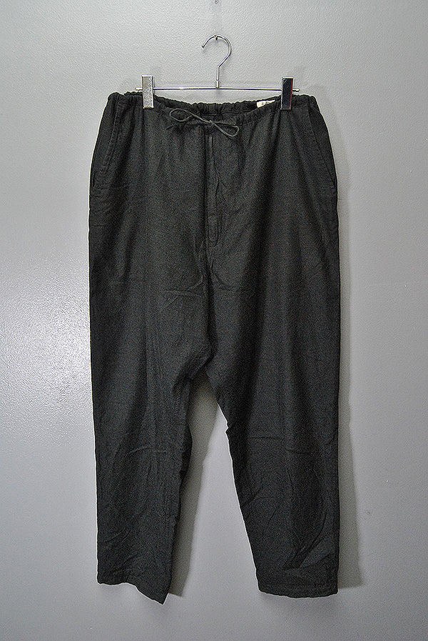 COMOLI コットンネル テーパードパンツ