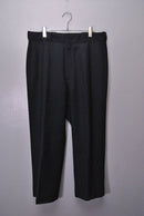 COMOLI ウールサージパンツ