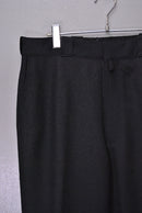 COMOLI ウールサージパンツ