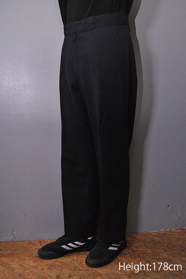 COMOLI ウールサージパンツ